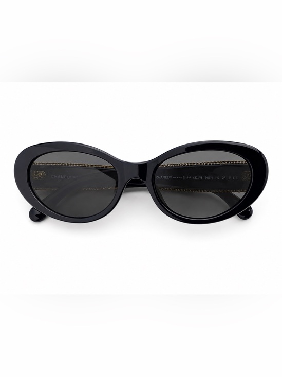 CHANEL Black Oval Women\'s Sunglasses with Dark Lenses Polarized.